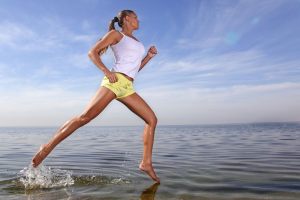beauty girl run on beach